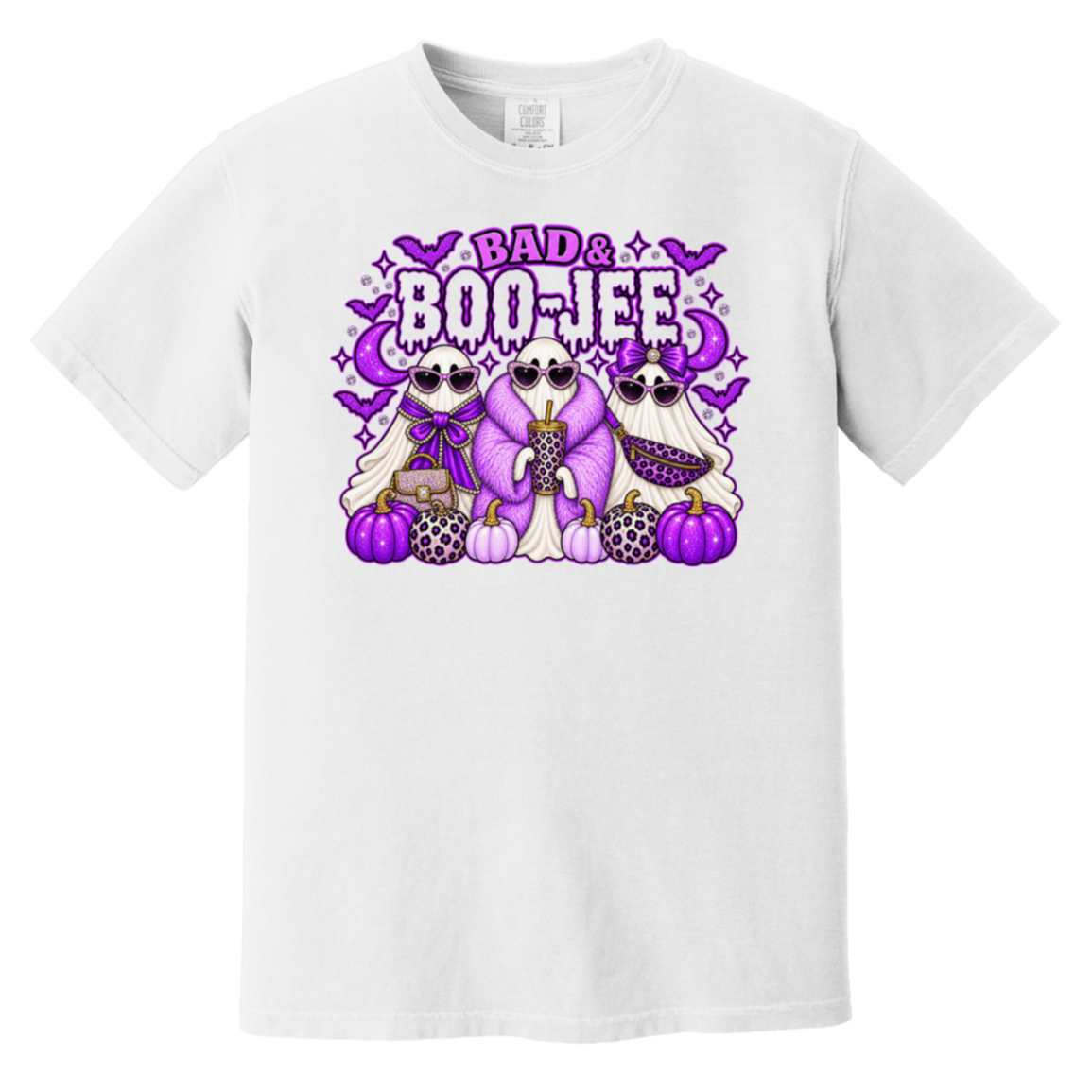 A white short-sleeve crewneck t-shirt featuring a colorful graphic print on the front. The graphic shows three cartoon ghosts in purple and black patterned outfits with purple pumpkins, bats, and the text 'BAD & BOO-JEE’ in purple and black.