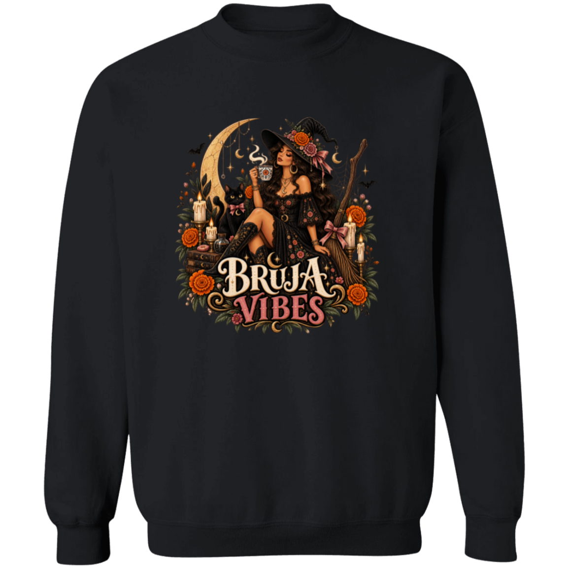 Black crewneck sweatshirt with a large graphic print on the front. The graphic features a witch in a black hat sitting on a broomstick next to a black cat, surrounded by orange flowers and the text 'BRUJA VIBES'.