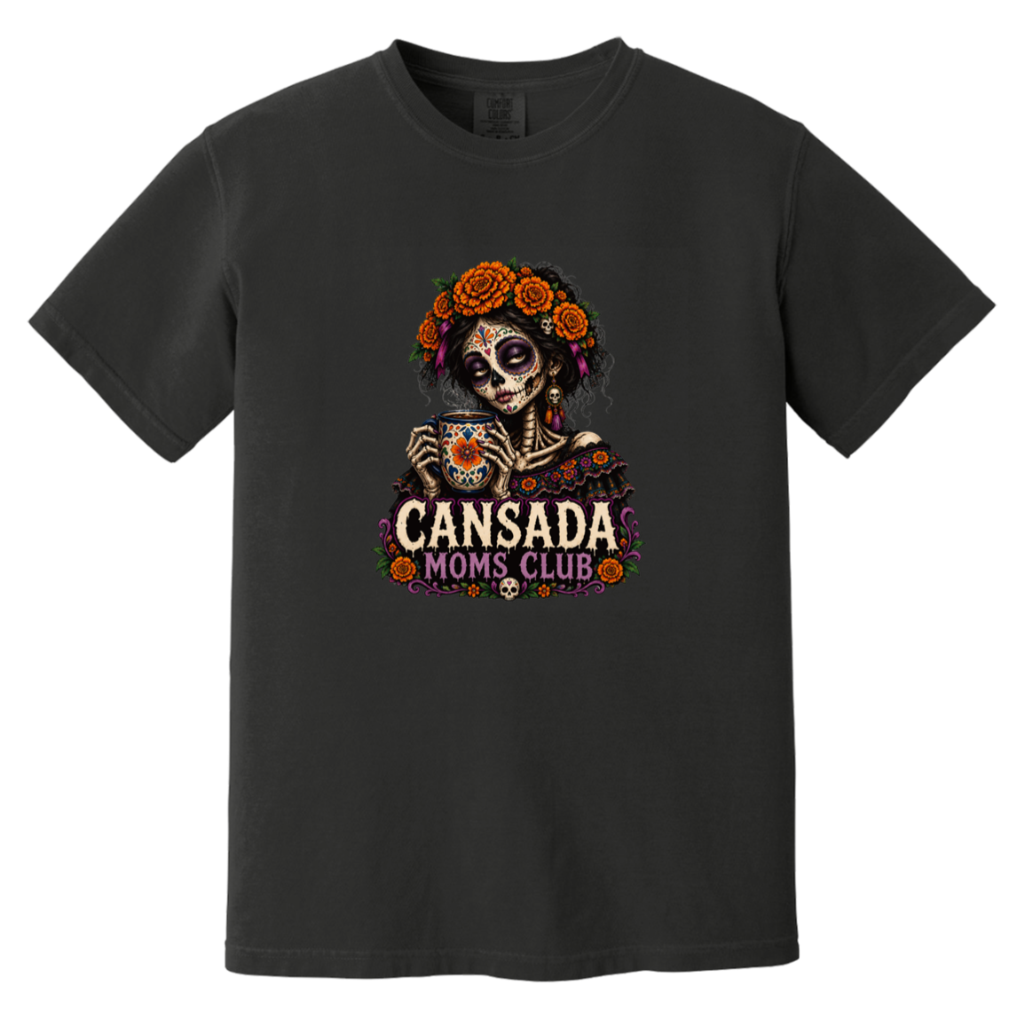 A black short-sleeve crewneck t-shirt featuring a colorful graphic of a Day of the Dead skeleton holding a teacup, surrounded by orange roses and the text 'CANSADA MOMS, CLUB'.