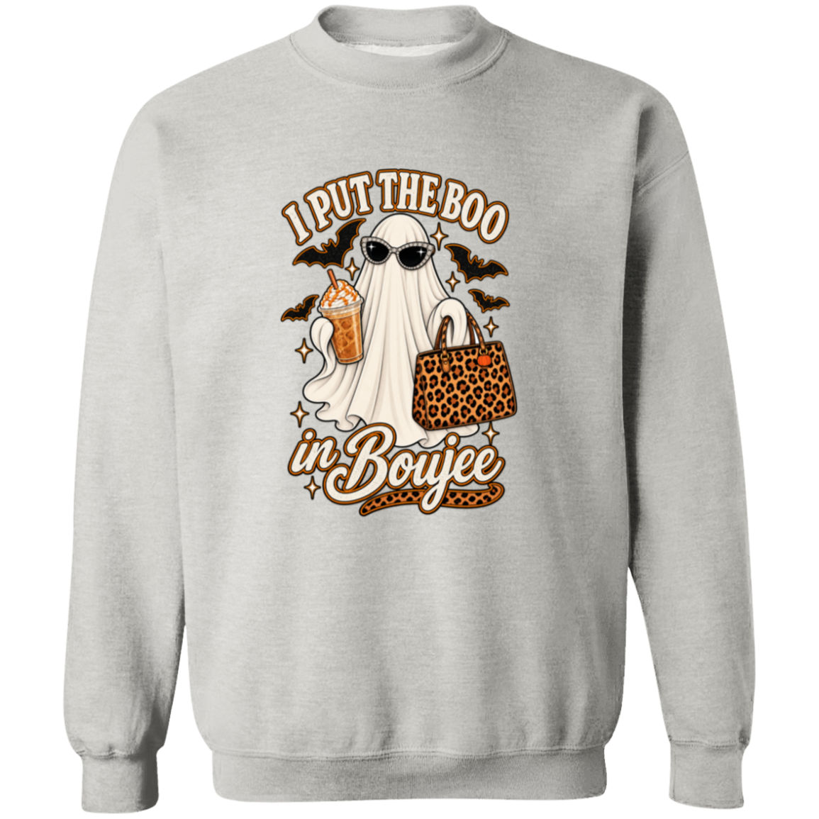 A light gray crewneck sweatshirt featuring a Halloween-themed graphic print. The design shows a ghost wearing sunglasses and holding a leopard-print handbag next to a drink, with the text 'I PUT THE BOO in Boujee' in brown and white stylized lettering.