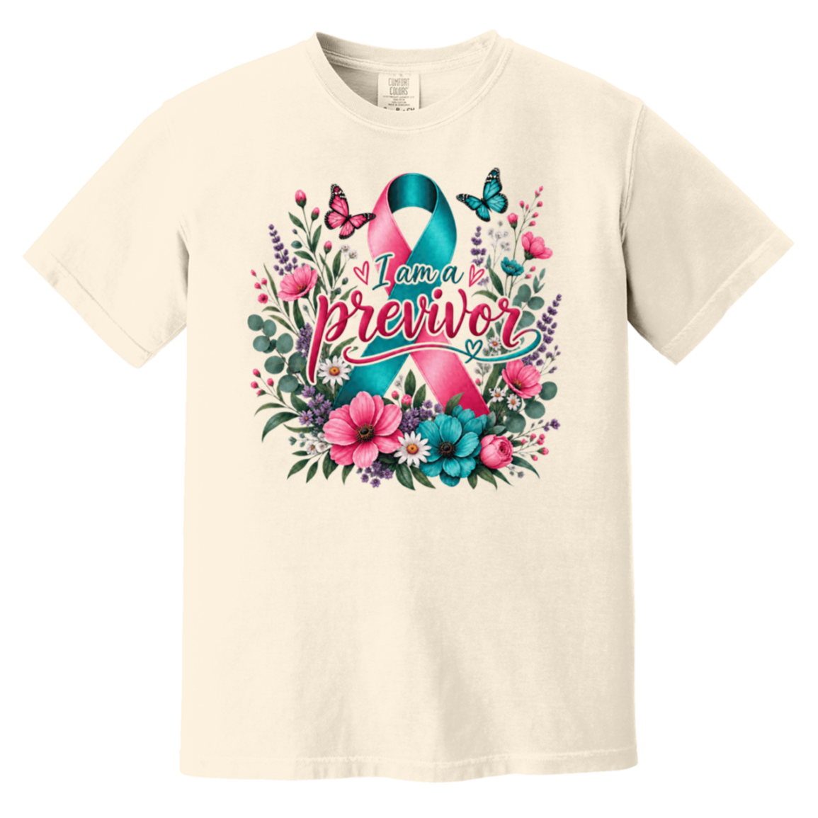 Cream short-sleeve crewneck t-shirt featuring a colorful graphic on the front. The graphic displays a pink and teal awareness ribbon surrounded by pink flowers, green leaves, purple blossoms, and butterflies, with the text 'I am a previvor' written across the center.