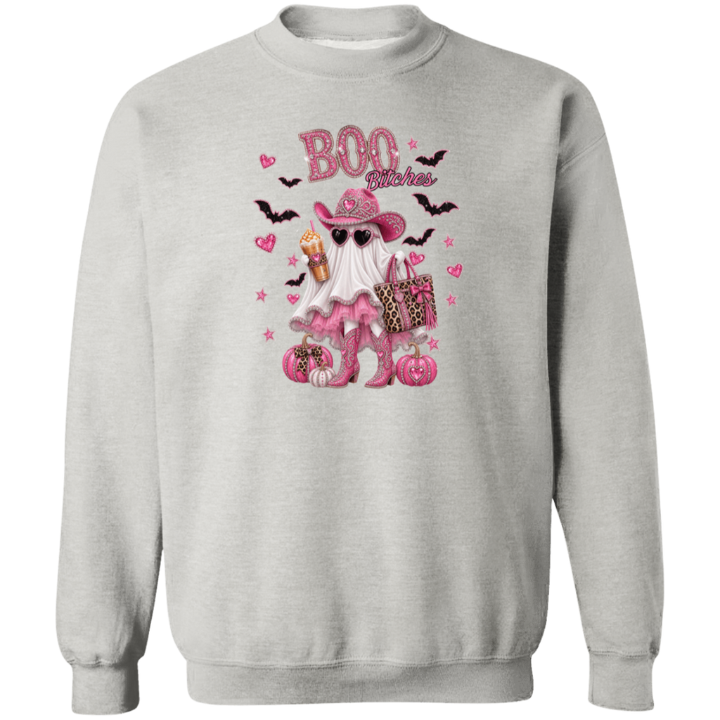 Light gray crewneck sweatshirt with a pink and black 'Boo Bitches' Halloween graphic featuring a ghost, cowboy hat, sunglasses, and pumpkins.