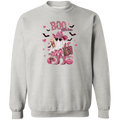 Light gray crewneck sweatshirt with a pink and black 'Boo Bitches' Halloween graphic featuring a ghost, cowboy hat, sunglasses, and pumpkins.