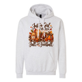 A light heather gray pullover hoodie with a detailed autumn football graphic on the chest. The graphic features the text 'Just a Girl With Love, Fall and Football' in brown script, surrounded by pumpkins, a football, plaid pattern, and fall leaves.