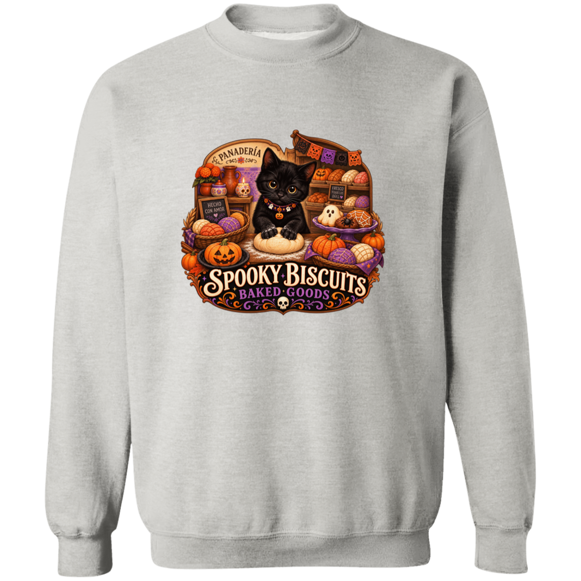 Light gray crewneck sweatshirt with a large, colorful Halloween-themed graphic on the front. The graphic features a black cat surrounded by pumpkins, ghosts, and the text 'Spooky Biscuits Baked Goods'.