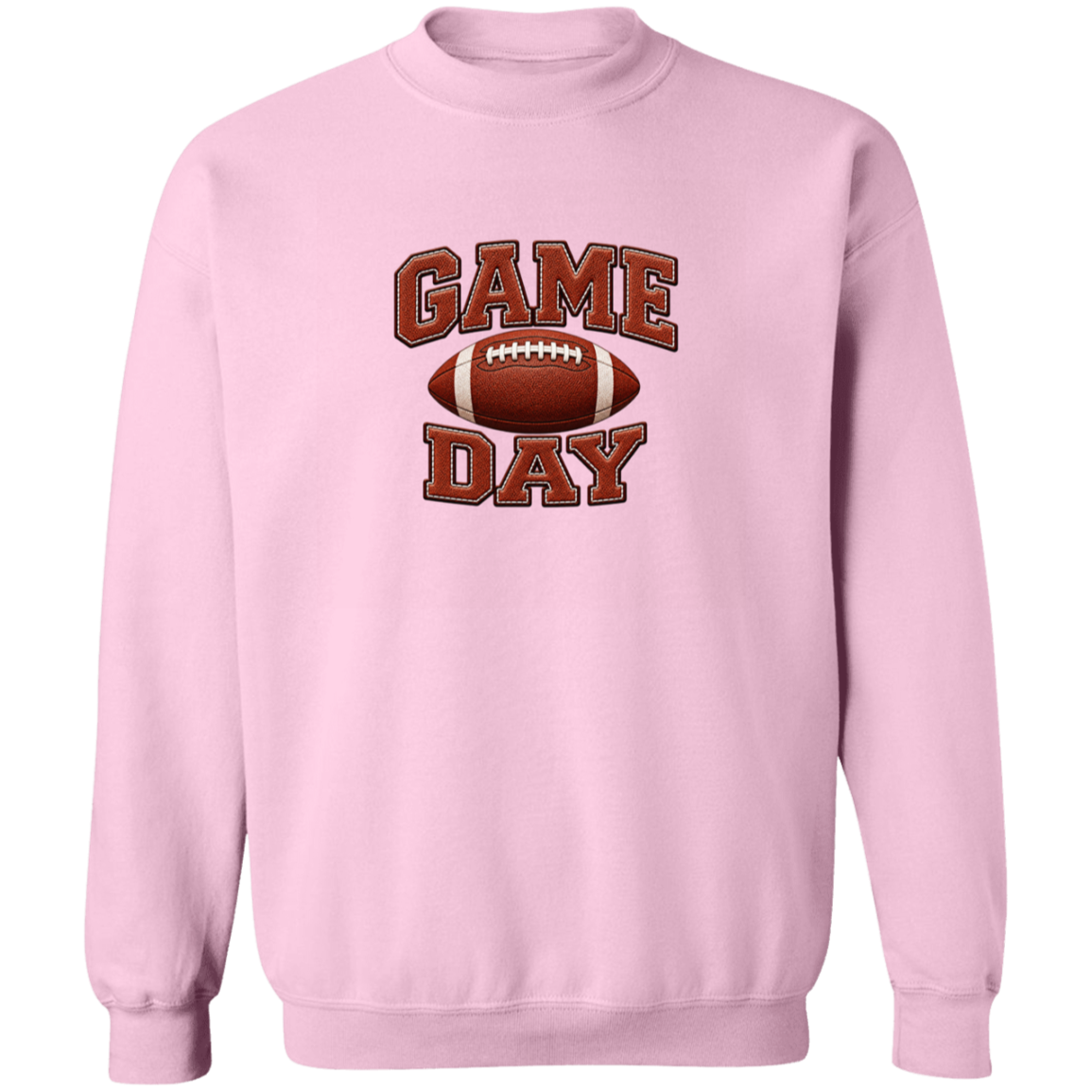 A light pink crewneck sweatshirt featuring a 'GAME DAY' football graphic on the chest, displayed against a solid white background.