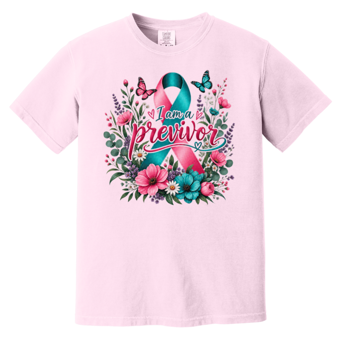 Light pink short-sleeve crewneck t-shirt featuring a colorful graphic on the front. The graphic displays a pink and teal awareness ribbon surrounded by pink flowers, green leaves, purple blossoms, and butterflies, with the text 'I am a previvor' written across the center.