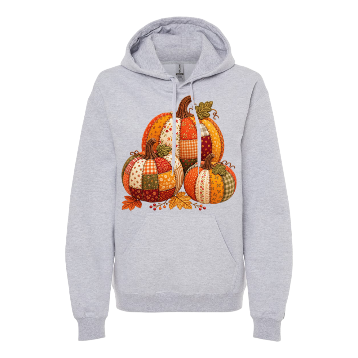 A light heather gray pullover hoodie featuring a colorful autumn patchwork pumpkin graphic on the front, set against a plain white background.