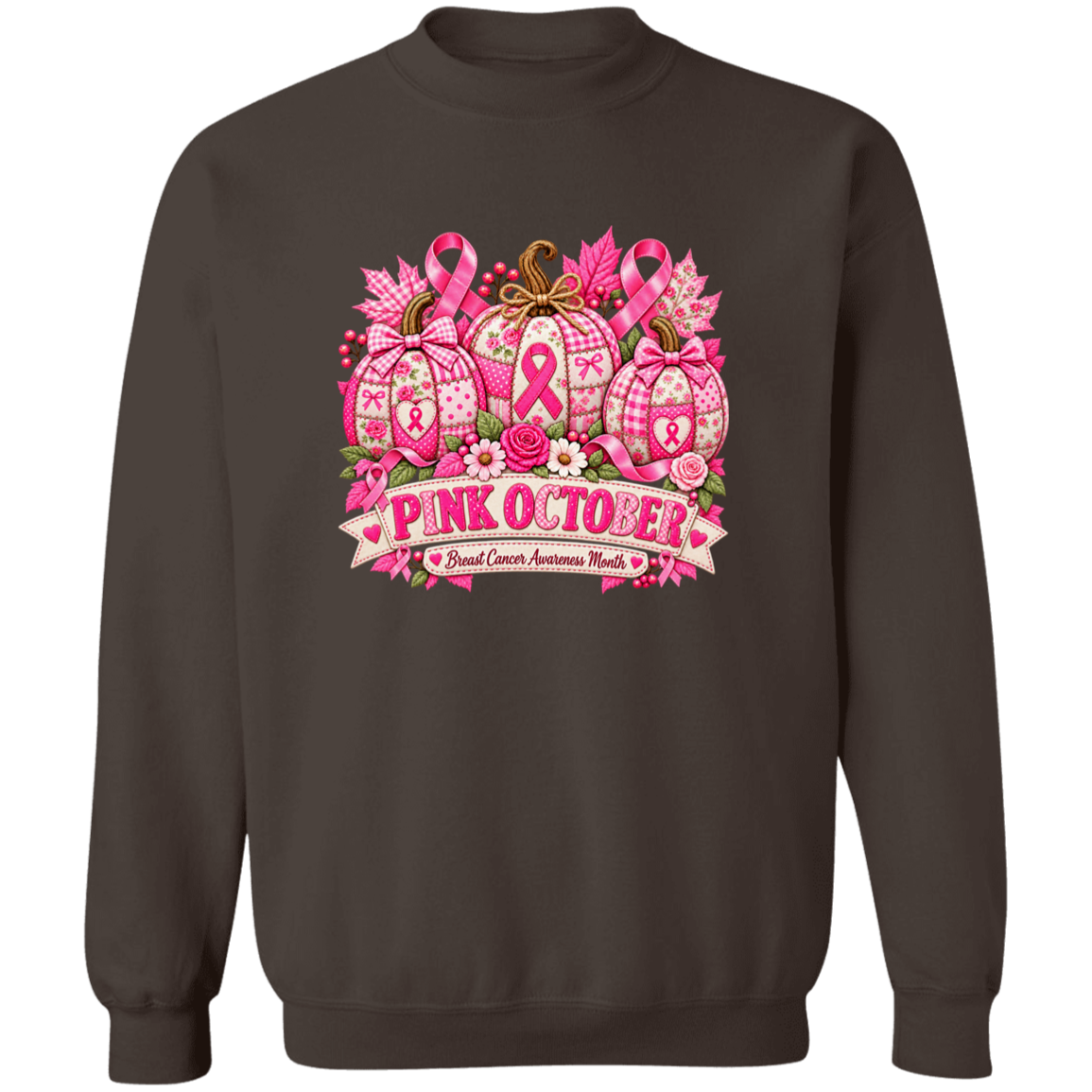 A dark brown crewneck sweatshirt featuring a large graphic print on the front. The graphic depicts four patterned pumpkins decorated with pink breast cancer ribbons, surrounded by pink bows, roses, and autumn leaves, with a banner below that reads 'PINK OCTOBER - Breast Cancer Awareness Month'.