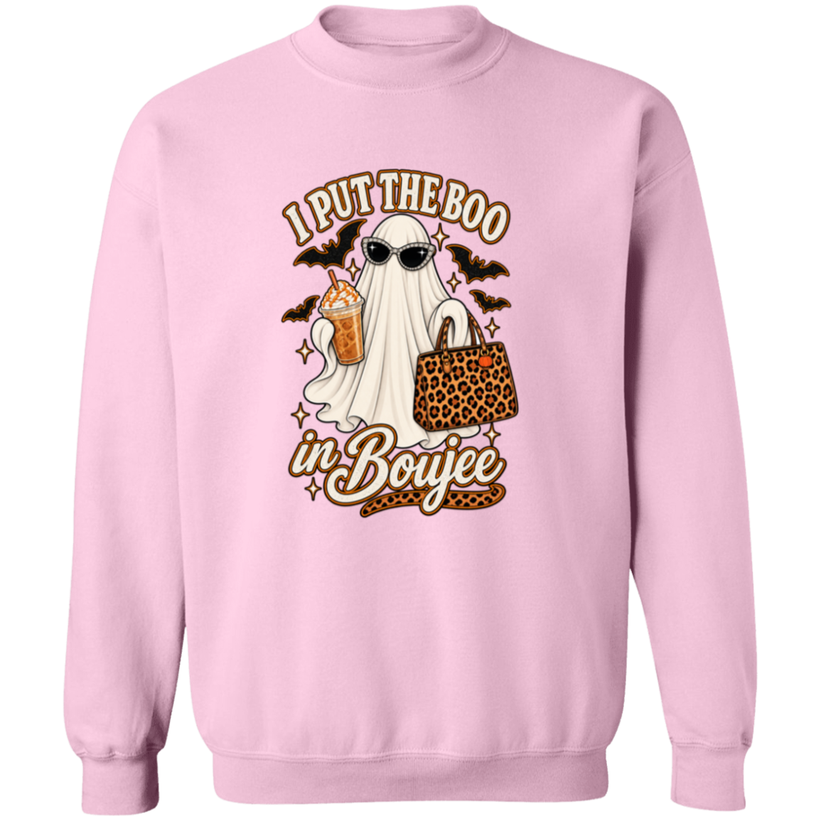 A light pink crewneck sweatshirt featuring a graphic print of a ghost dressed as a woman with sunglasses, holding a leopard-print handbag and a drink, with the text 'I PUT THE BOO in Boujee' and small bats.