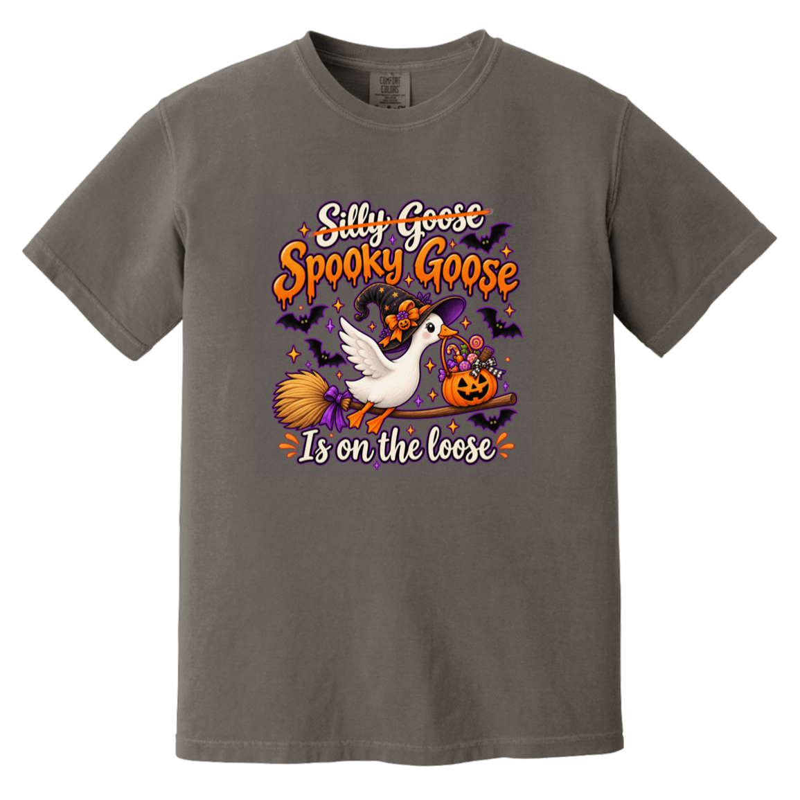 A dark gray crewneck t-shirt featuring a colorful Halloween graphic with a white goose, a witch's broom, a jack-o'-lantern, and bats, with the text 'Silly Goose Spooky Goose Is on the loose'.