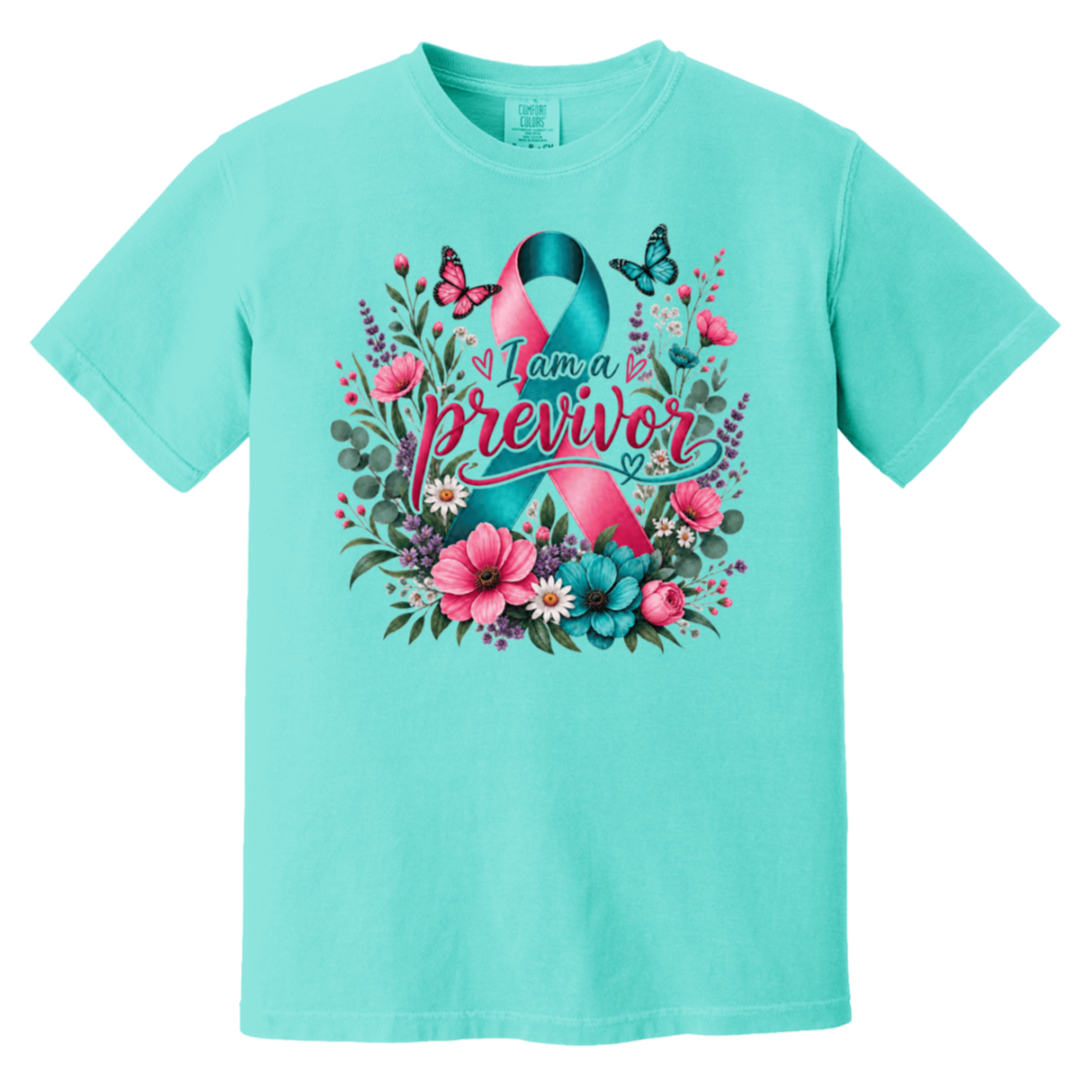 Teal short-sleeve crewneck t-shirt featuring a colorful graphic on the front. The graphic displays a pink and teal awareness ribbon surrounded by pink flowers, green leaves, purple blossoms, and butterflies, with the text 'I am a previvor' written across the center.
