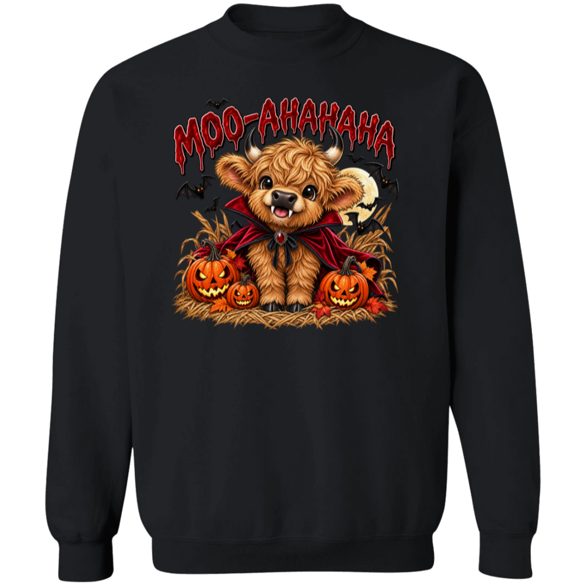 A black crewneck sweatshirt featuring a cartoon graphic of a fluffy brown Scottish highland cow dressed in a red cape, surrounded by jack-o'-lanterns, with the text 'MOO-AAHAHAHA' in red above it.