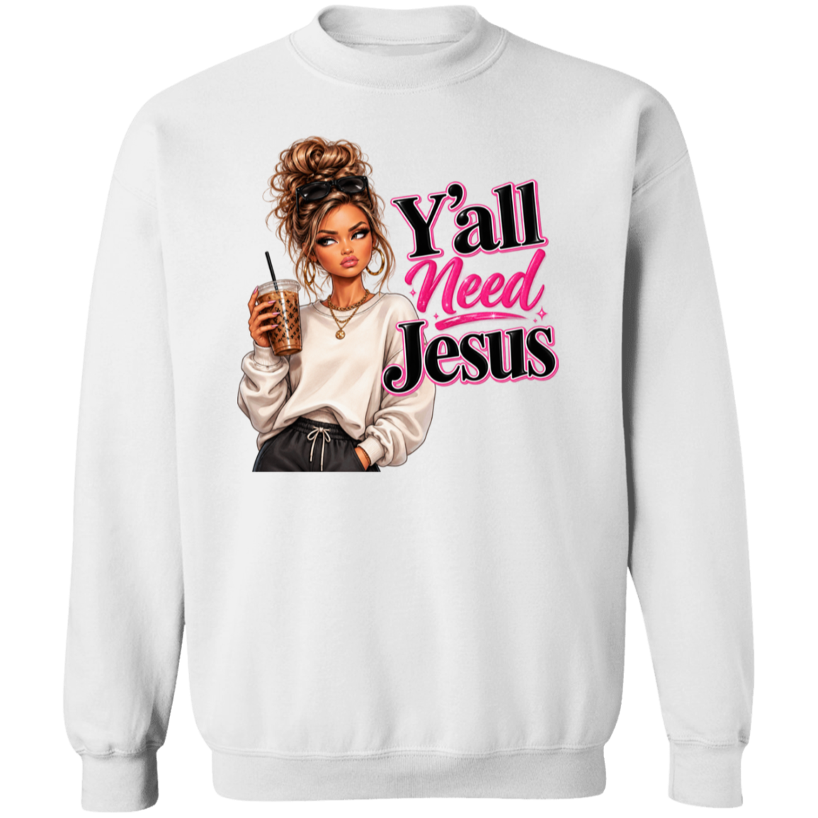 A white crewneck sweatshirt featuring a graphic print of a cartoon woman holding an iced coffee next to the text 'Y'all Need Jesus' in pink and black lettering.