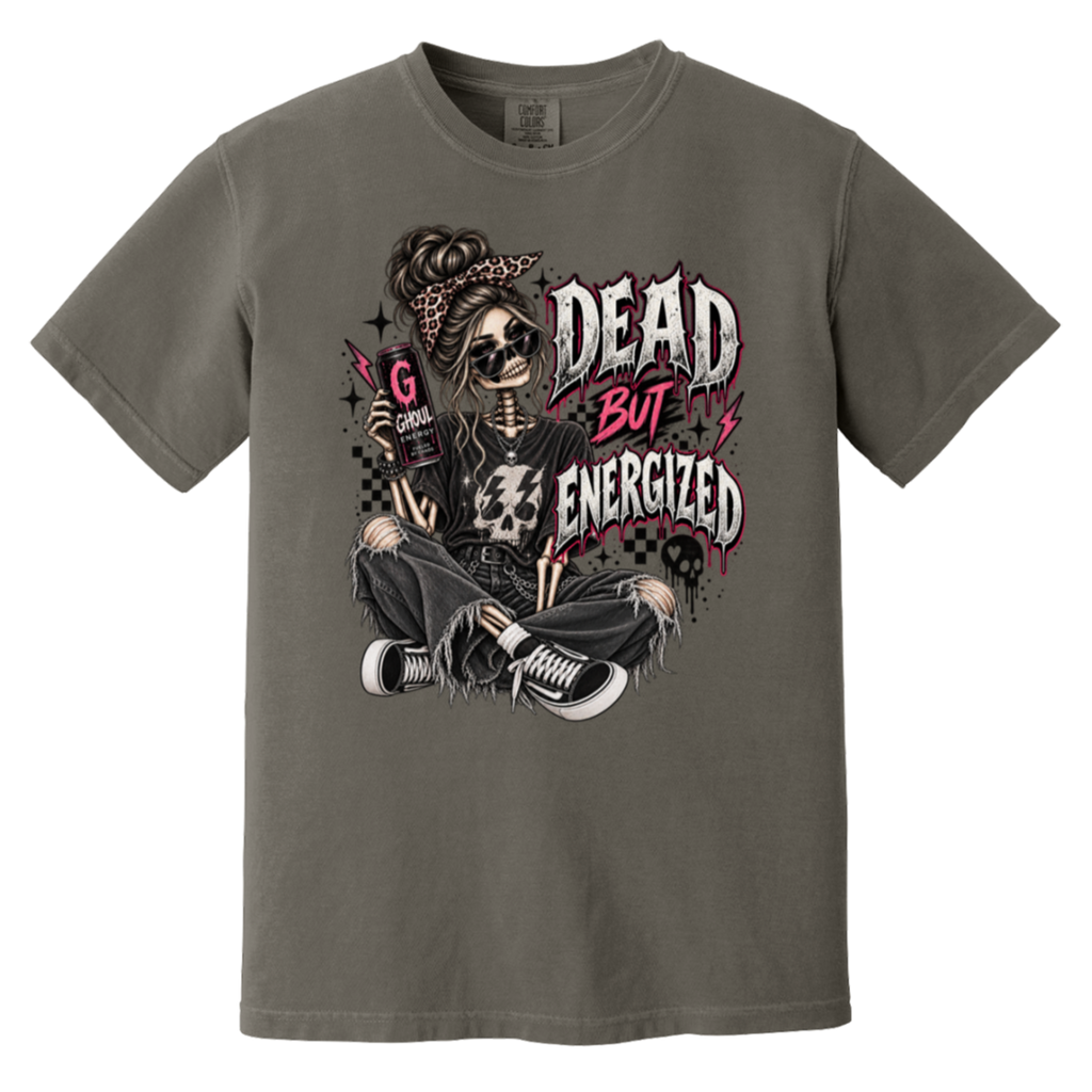 dark gray tshirt with the graphic of a skeleton wearing jeans and a tshirt holding an energy drink with a text "DEAD BUT ENERGIZED"