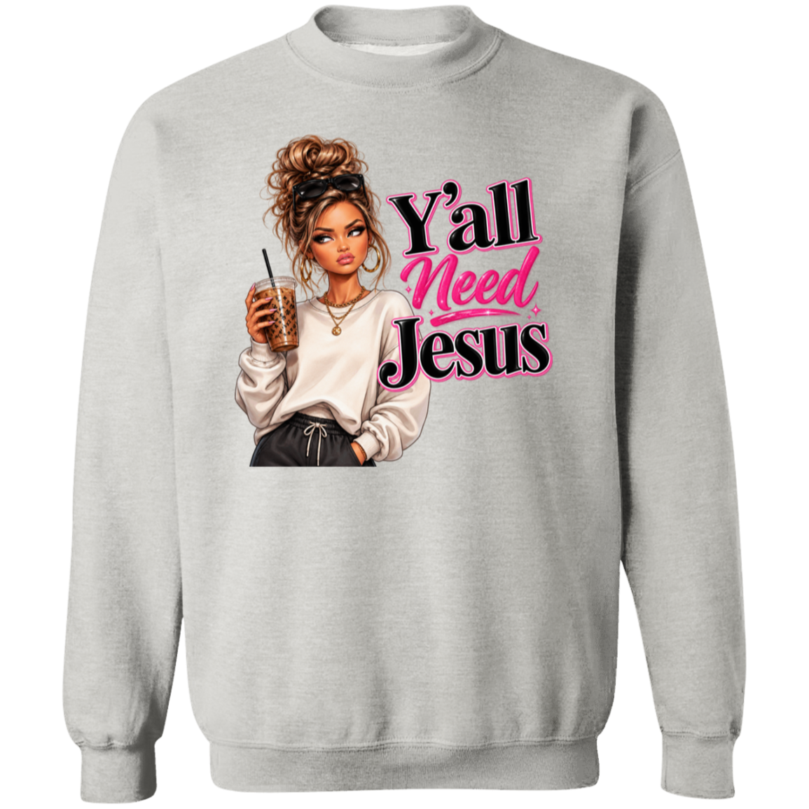 A light gray crewneck sweatshirt featuring a graphic print of a woman holding an iced coffee next to the text 'Y'all Need Jesus' in pink and black lettering.