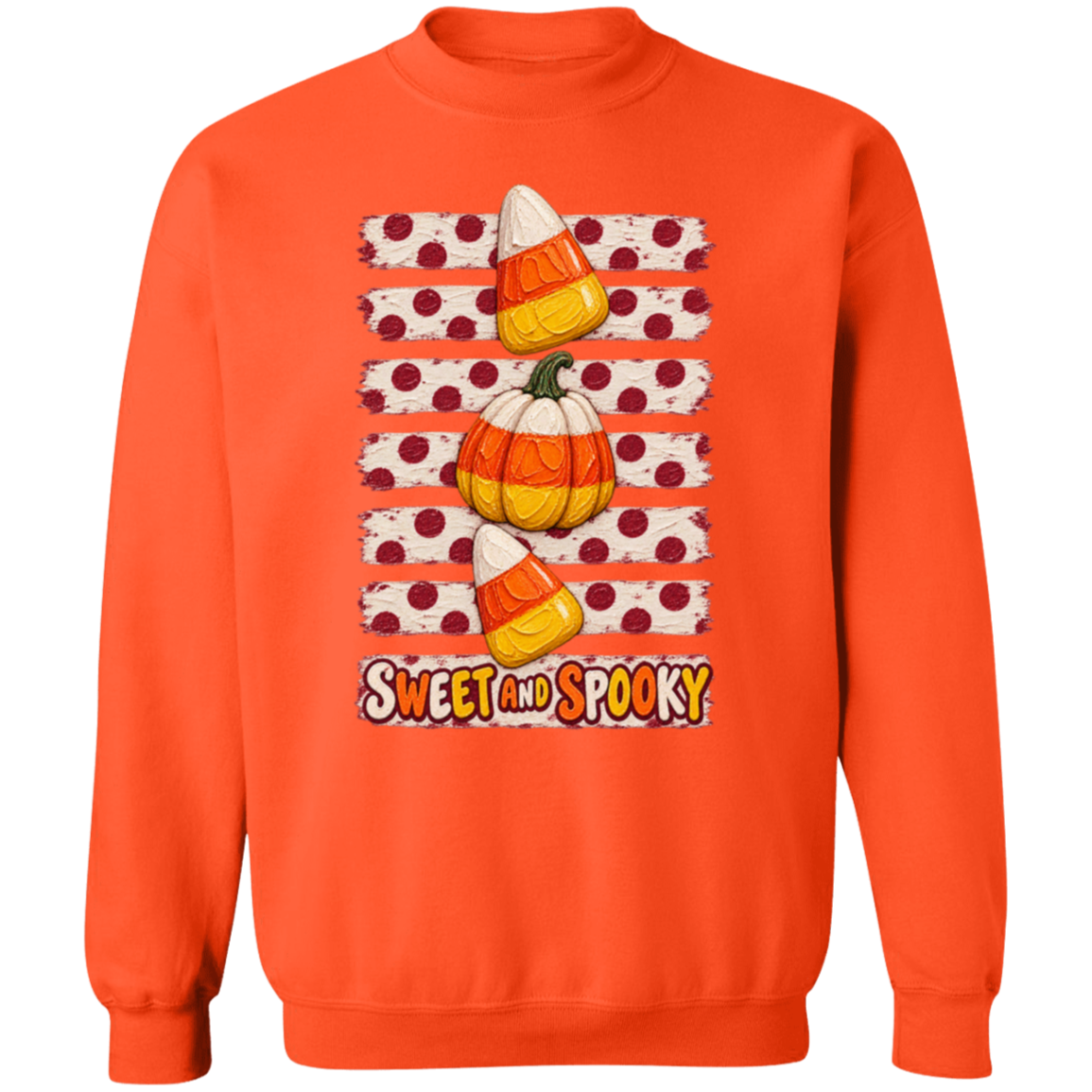 orange sweatshirt with a Halloween design with two candy corns, one pumpkin, red polka dots on a distressed cream background, and the words 'SWEET AND SPOOKY' at the bottom.
