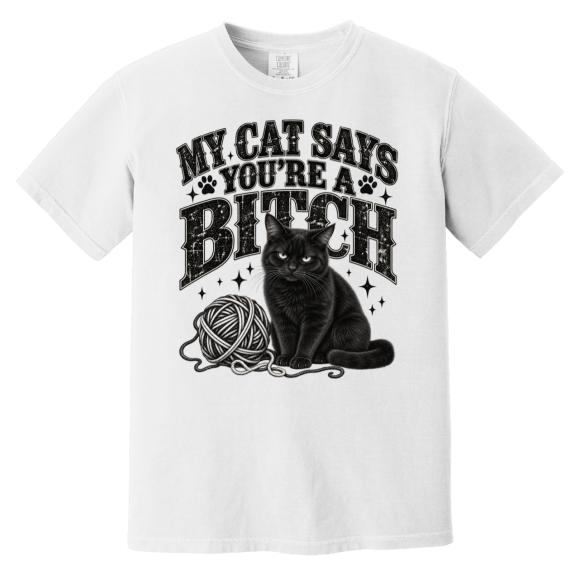 A white short-sleeve crewneck t-shirt featuring a black graphic print of a black cat sitting next to a ball of yarn, with the text 'MY CAT SAYS YOU'RE A BITCH' above it.